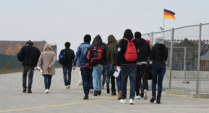 Merkel expects 60,000 migrants to leave Germany voluntarily this year